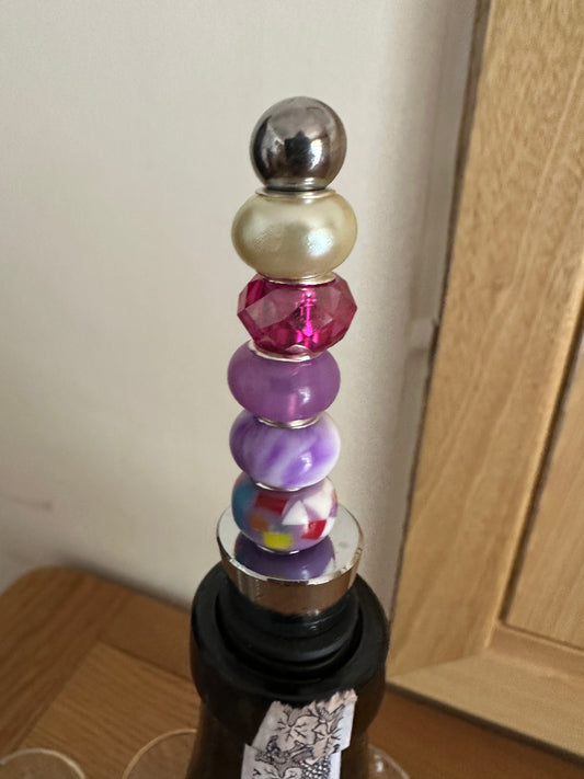 Beaded Bottle stopper in purples and pearl