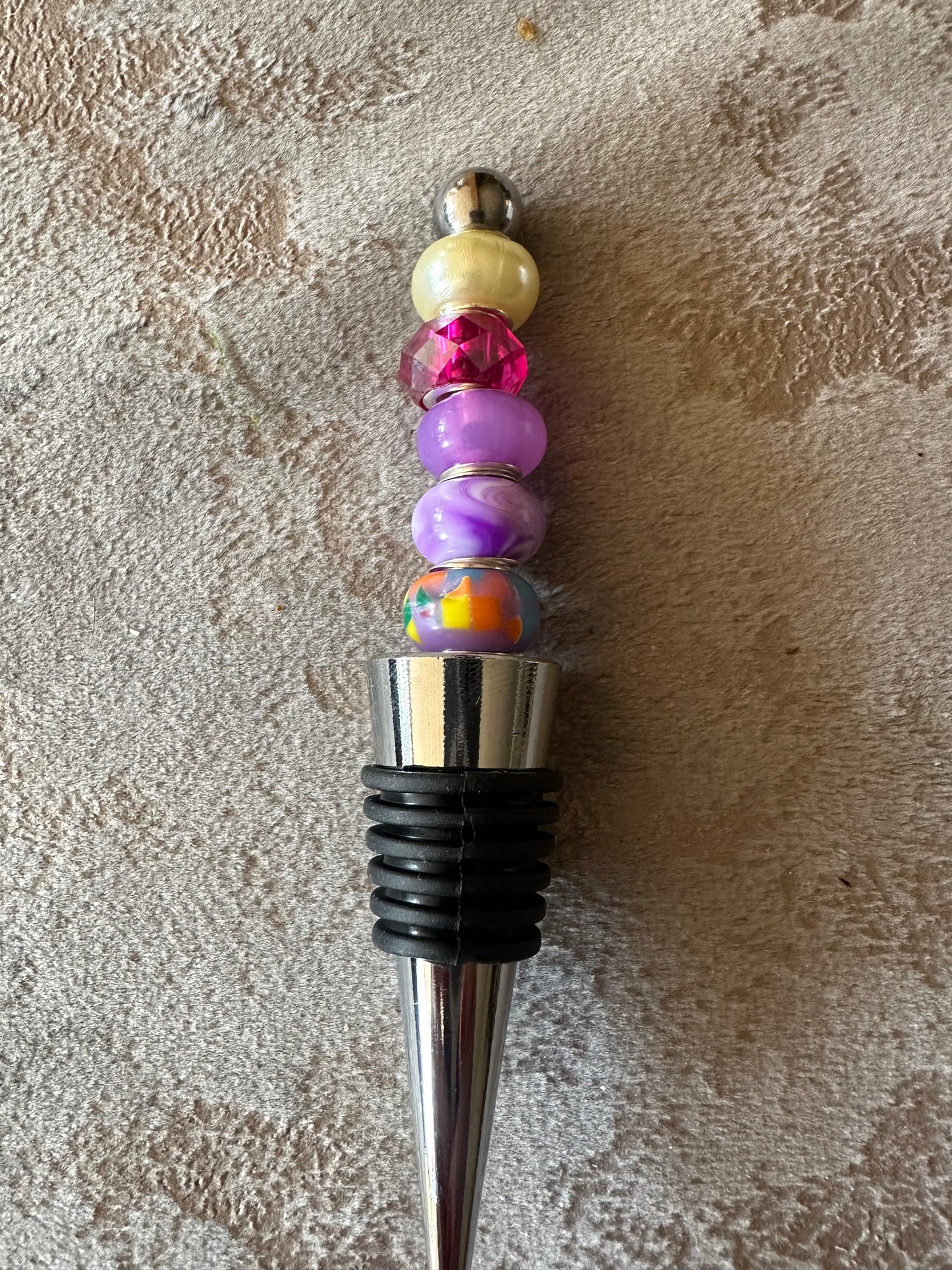 Beaded Bottle stopper in purples and yellows