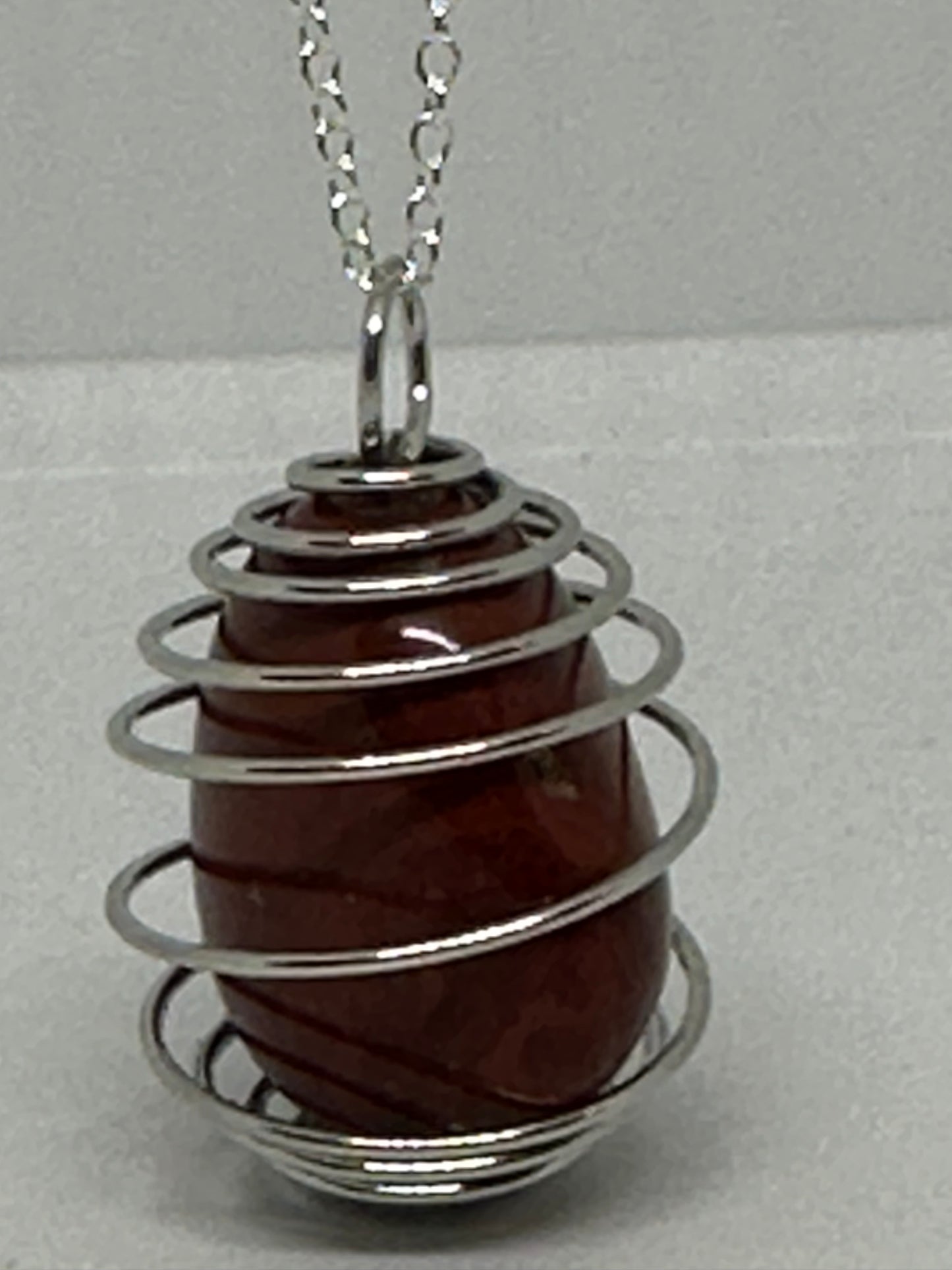 Semi precious caged stone necklace