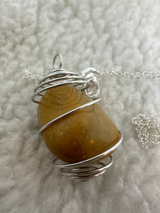 Semi precious caged stone necklace