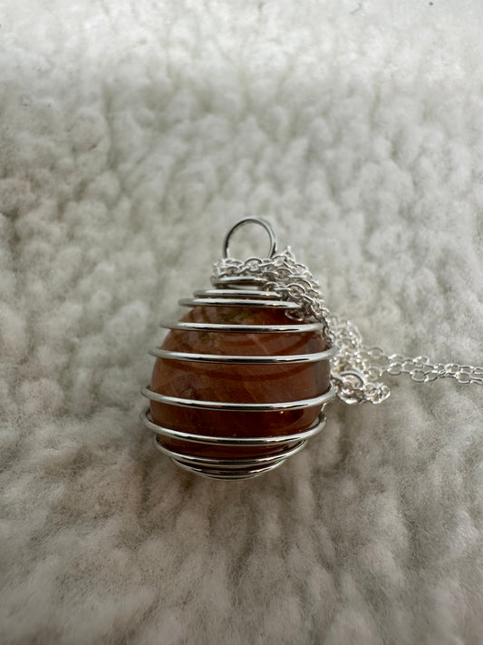 Semi precious caged stone necklace