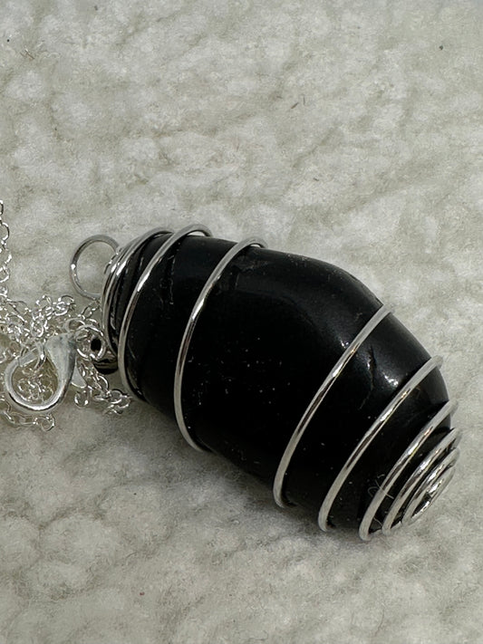 Semi precious caged stone necklace