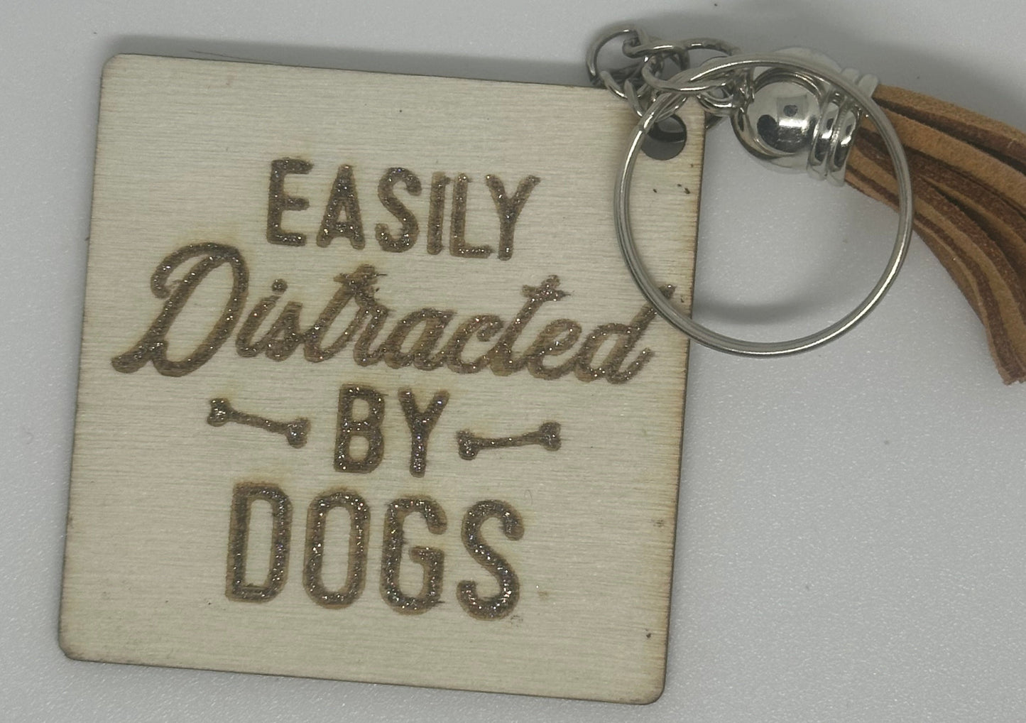 Funny wooden Key Ring distracted by dogs