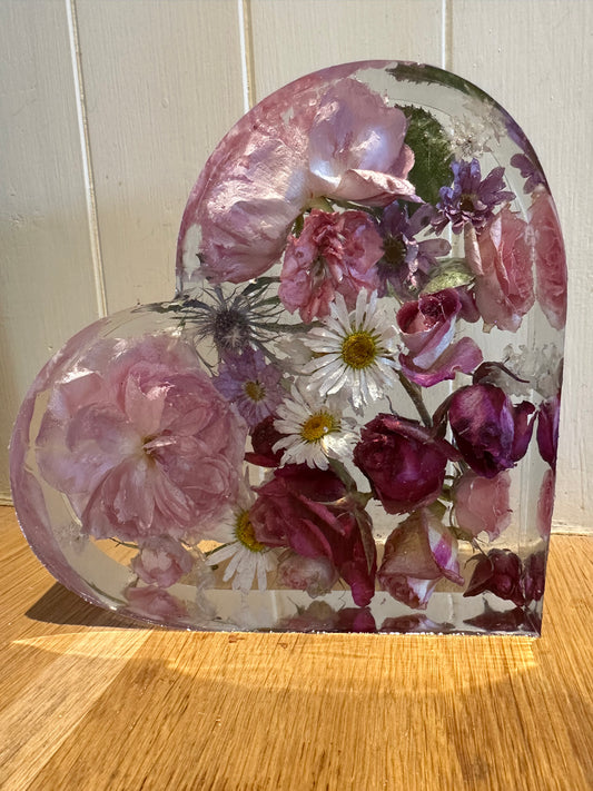 Garden flowers in resin hearts